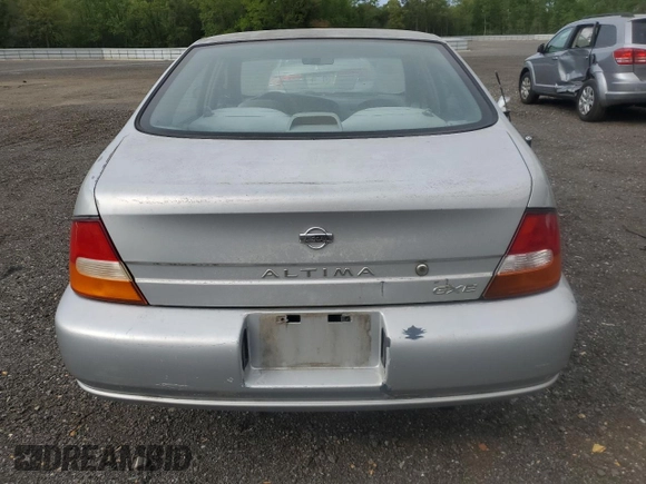 1999 Nissan Altima XE z VIN 1N4DL01D1XC202466, wystawiony jako Copart lot #54548015 z przebiegiem 131 409 mil mil oraz Szkoda całkowita • Salvage title. Historia ofert i sprzedaży dostępna na DreamBid. Obrazek 6.