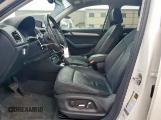 2017 Audi Q3 Premium with VIN WA1BCCFS4HR014916, listed as a Copart auction lot 57602295 with 92,348 mi miles and Salvage title. Bid and sale history available at DreamBid. Image 7.