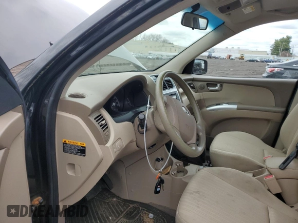 2009 Kia Sportage LX with VIN KNDJE723097622429, listed as a Copart auction lot 52960575 with 167,492 mi miles and Salvage Title. Bid and sale history available at carsss.com. Image 7.