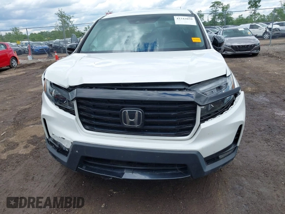 2021 Honda Ridgeline Sport with VIN 5FPYK3F14MB005117, listed as a IAAI auction lot 42343059 with 58,862 mi miles and . Bid and sale history available at DreamBid. Image 12.