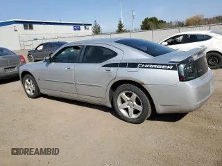2010 Dodge Charger SXT with VIN 2B3CA3CV5AH233504, listed as a Copart auction lot 51800395 with 253,535 mi miles and Salvage Title. Bid and sale history available at carsss.com. Image 2.