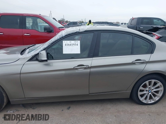 2018 BMW 3 Series 320i with VIN WBA8E1G51JNU92342, listed as a IAAI auction lot 41641934 with 27,477 mi miles. Bid and sale history available at carsss.com. Image 14.