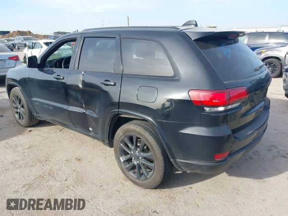 2018 Jeep Grand Cherokee Laredo E with VIN 1C4RJEAG4JC311699, listed as a IAAI auction lot 41876920 with 42,584 mi miles and . Bid and sale history available at DreamBid. Image 3.