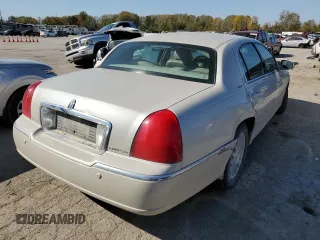 2004 Lincoln Town Car Ultimate z VIN 1LNHM83WX4Y607645, wystawiony jako Copart lot #72791093 z przebiegiem 172 917 mil mil oraz Szkody całkowita. Historia ofert i sprzedaży dostępna na DreamBid. Obrazek 3.