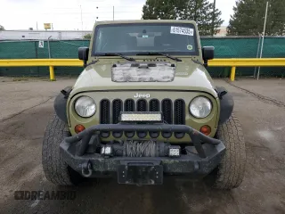 2013 Jeep Wrangler Sport with VIN 1C4AJWAGXDL586971, listed as a Copart auction lot 61574535 with 178,927 mi miles and Clean title. Bid and sale history available at DreamBid. Image 5.