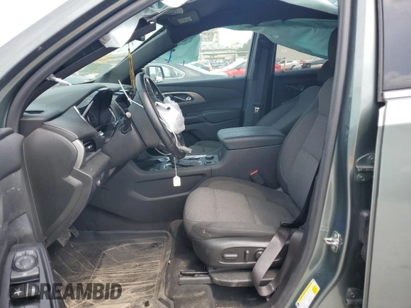2023 Chevrolet Traverse LT Cloth with VIN 1GNERGKW3PJ108498, listed as a Copart auction lot 57167675 with 101,936 mi miles and Salvage title. Bid and sale history available at DreamBid. Image 7.