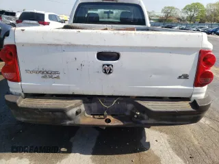 2007 Dodge Dakota z VIN 1D7HW22P07S176624, wystawiony jako Copart lot #68370994 z przebiegiem 284 863 mil mil oraz Szkoda całkowita • Salvage title. Historia ofert i sprzedaży dostępna na DreamBid. Obrazek 6.