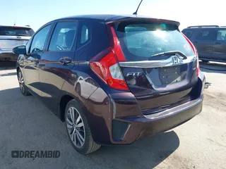 2015 Honda Fit EX-L z VIN 3HGGK5H80FM725959, wystawiony jako IAAI lot #42526513 z przebiegiem 110 885 mil mil oraz . Historia ofert i sprzedaży dostępna na DreamBid. Obrazek 3.