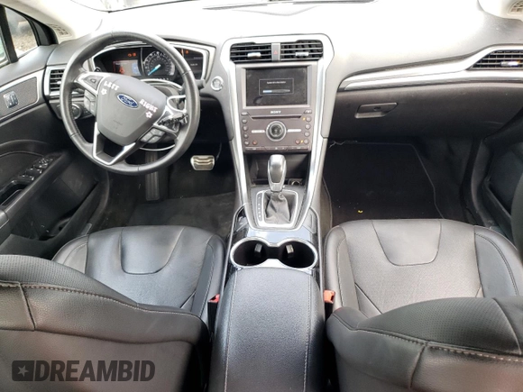 2016 Ford Fusion Titanium z VIN 3FA6P0K90GR399896, wystawiony jako Copart lot #63504265 z przebiegiem 37 066 mil mil oraz Szkoda całkowita • Salvage title. Historia ofert i sprzedaży dostępna na DreamBid. Obrazek 8.