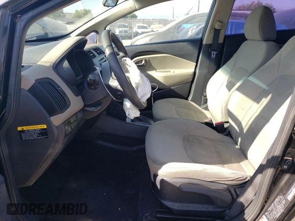 2014 Kia Rio LX with VIN KNADM4A35E6407058, listed as a Copart auction lot 72997044 with 76,215 mi miles and Salvage Title. Bid and sale history available at DreamBid. Image 7.