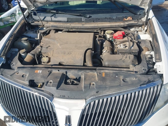 2014 Lincoln MKT EcoBoost z VIN 2LMHJ5AT9EBL52165, wystawiony jako IAAI lot #41246424 z przebiegiem 154 332 mil mil oraz . Historia ofert i sprzedaży dostępna na DreamBid. Obrazek 10.