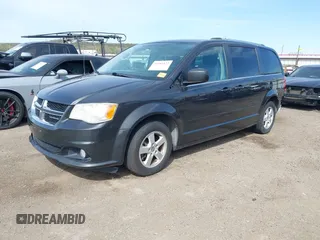 2011 Dodge Grand Caravan Crew with VIN 2D4RN5DG3BR660235, listed as a IAAI auction lot 41945522 with 148,924 mi miles and . Bid and sale history available at DreamBid. Image 2.