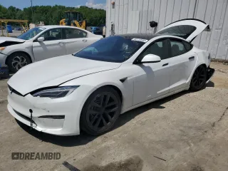 2022 Tesla Model S Plaid with VIN 5YJSA1E63NF460643, listed as a Copart auction lot 60113555 with Not provided miles and Salvage title. Bid and sale history available at DreamBid. Image 1.