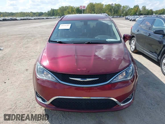 2018 Chrysler Pacifica Touring L with VIN 2C4RC1BG0JR279665, listed as a IAAI auction lot 40336389 with 80,835 mi miles and . Bid and sale history available at DreamBid. Image 12.