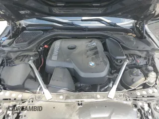 2024 BMW 5 Series 530i with VIN WBA43FJ09RCR05243, listed as a Copart auction lot 61690705 with 34,450 mi miles and Salvage title. Bid and sale history available at DreamBid. Image 11.