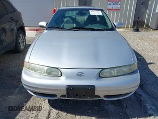 2002 Oldsmobile Alero GLS z VIN 1G3NF52E92C217607, wystawiony jako IAAI lot #41628081 z przebiegiem 78 658 mil mil oraz . Historia ofert i sprzedaży dostępna na DreamBid. Obrazek 6.