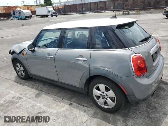 2015 MINI Hardtop 4 Door with VIN WMWXS5C56FT828846, listed as a Copart auction lot 54943765 with 78,964 mi miles and Salvage Title. Bid and sale history available at DreamBid. Image 2.