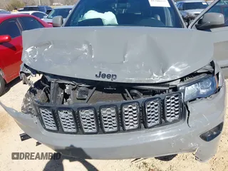 2019 Jeep Grand Cherokee Laredo E with VIN 1C4RJFAG2KC855108, listed as a IAAI auction lot 41780277 with 81,283 mi miles and . Bid and sale history available at DreamBid. Image 6.