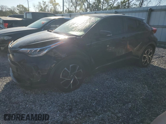 2021 Toyota C-HR LE with VIN NMTKHMBX0MR125200, listed as a Copart auction lot 48676315 with 82,241 mi miles and Salvage Title. Bid and sale history available at carsss.com. Image 1.