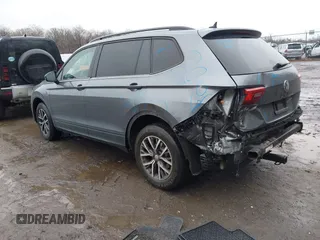 2021 Volkswagen Tiguan S with VIN 3VV0B7AX3MM026708, listed as a IAAI auction lot 41527399 with 80,061 mi miles and . Bid and sale history available at DreamBid. Image 3.