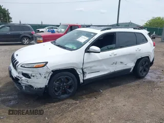 2016 Jeep Cherokee Altitude with VIN 1C4PJMCB3GW121211, listed as a IAAI auction lot 42470241 with 168,343 mi miles and . Bid and sale history available at DreamBid. Image 14.