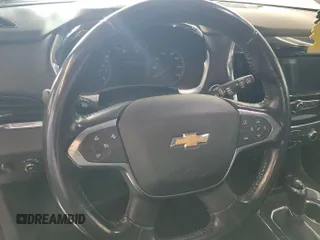 2020 Chevrolet Traverse LT Cloth z VIN 1GNEVMKW4LJ292564, wystawiony jako IAAI lot #42866891 z przebiegiem 72 750 mil mil oraz . Historia ofert i sprzedaży dostępna na DreamBid. Obrazek 18.