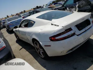 2009 Aston Martin DB9 z VIN SCFAD01E59GA10941, wystawiony jako Copart lot #57220313 z przebiegiem 24 818 mil mil oraz . Historia ofert i sprzedaży dostępna na DreamBid. Obrazek 2.