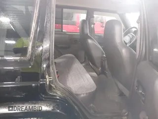 2000 Jeep Cherokee z VIN 1J4FF48S8YL216995, wystawiony jako IAAI lot #42126841 z przebiegiem 178 000 mil mil oraz . Historia ofert i sprzedaży dostępna na DreamBid. Obrazek 8.