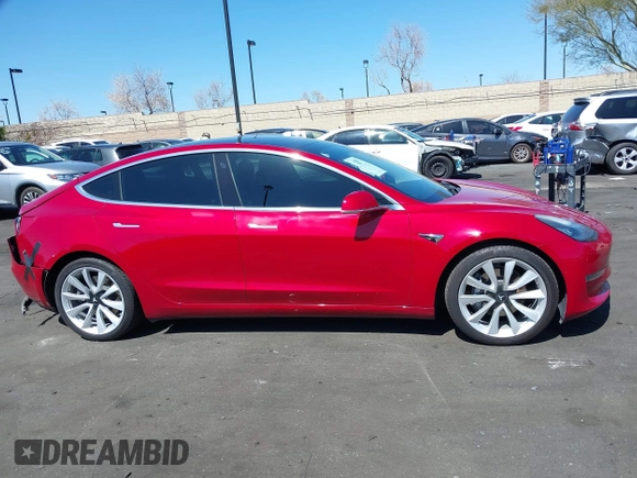 2018 Tesla Model 3 Long Range Battery with VIN 5YJ3E1EB5JF146184, listed as a IAAI auction lot 41808346 with 97,496 mi miles and . Bid and sale history available at DreamBid. Image 14.