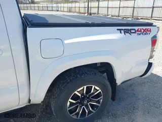 2023 Toyota Tacoma 4WD SR with VIN 3TMCZ5AN8PM647523, listed as a IAAI auction lot 41887896 with 17,864 mi miles. Bid and sale history available at carsss.com. Image 18.