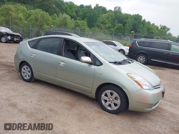 2007 Toyota Prius z VIN JTDKB20U673287354, wystawiony jako IAAI lot #42510185 z przebiegiem 253 448 mil mil oraz . Historia ofert i sprzedaży dostępna na DreamBid. Obrazek 1.