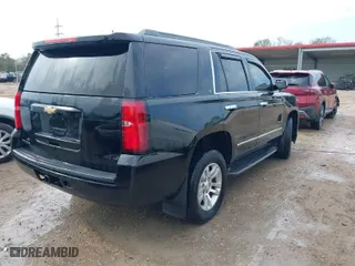 2017 Chevrolet Tahoe LT with VIN 1GNSKBKC3HR135025, listed as a IAAI auction lot 41176528 with 168,195 mi miles. Bid and sale history available at carsss.com. Image 4.