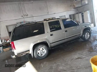 1999 GMC Suburban with VIN 3GKFK16R7XG549530, listed as a IAAI auction lot 41778323 with 174,866 mi miles. Bid and sale history available at carsss.com. Image 4.
