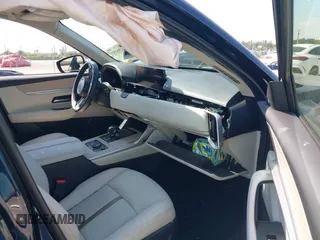 2024 Mazda CX-90 Premium Plus with VIN JM3KKEHD8R1186750, listed as a IAAI auction lot 41795353 with 5,144 mi miles and . Bid and sale history available at DreamBid. Image 5.