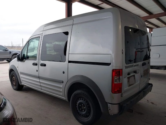 2010 Ford Transit Connect XL with VIN NM0LS6AN8AT028971, listed as a IAAI auction lot 41568507 with 238,621 mi miles. Bid and sale history available at carsss.com. Image 3.