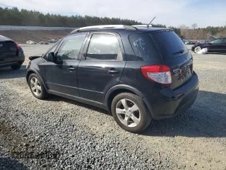 2010 Suzuki SX4 Touring with VIN JS2YB5A70A6300518, listed as a Copart auction lot 45526315 with 161,090 mi miles and Salvage Title. Bid and sale history available at carsss.com. Image 2.