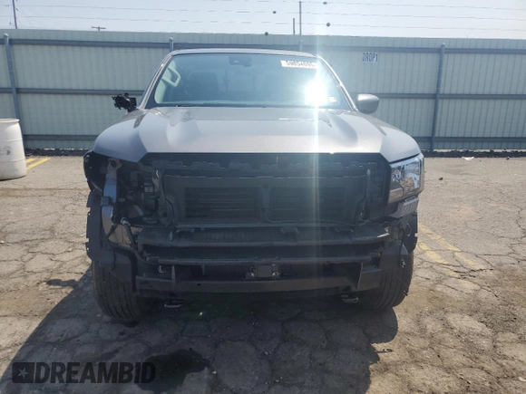 2024 Nissan Frontier SV with VIN 1N6ED1FKXRN605620, listed as a Copart auction lot 59854695 with 8,828 mi miles and Salvage title. Bid and sale history available at DreamBid. Image 5.