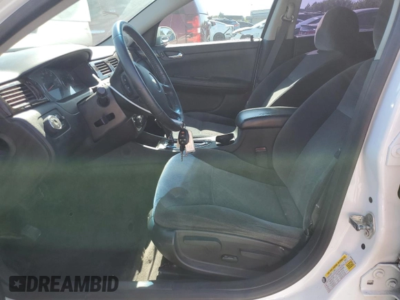 2014 Chevrolet Impala LT with VIN 2G1WB5E39E1167594, listed as a Copart auction lot 55836905 with 136,690 mi miles and Salvage Title. Bid and sale history available at DreamBid. Image 7.
