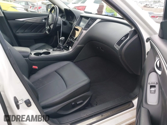 2014 Infiniti Q50 Premium z VIN JN1BV7APXEM670656, wystawiony jako IAAI lot #42085636 z przebiegiem 88 147 mil mil oraz . Historia ofert i sprzedaży dostępna na DreamBid. Obrazek 5.