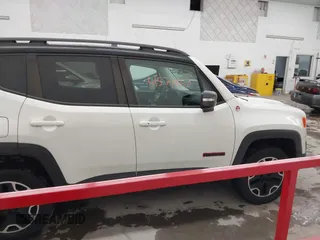 2015 Jeep Renegade Trailhawk with VIN ZACCJBCT2FPC33277, listed as a IAAI auction lot 41571863 with 98,912 mi miles and . Bid and sale history available at DreamBid. Image 14.