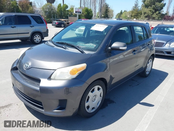 2008 Scion xD with VIN JTKKU10438J027228, listed as a IAAI auction lot 41973795 with 205,044 mi miles. Bid and sale history available at carsss.com. Image 6.