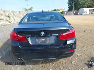 2014 BMW 5 Series 528i xDrive z VIN WBA5A7C58ED617405, wystawiony jako IAAI lot #42375456 z przebiegiem 135 184 mil mil oraz . Historia ofert i sprzedaży dostępna na DreamBid. Obrazek 17.