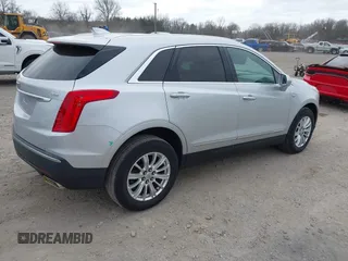 2017 Cadillac XT5 FWD with VIN 1GYKNARS3HZ184081, listed as a IAAI auction lot 41795974 with 109,032 mi miles. Bid and sale history available at carsss.com. Image 4.