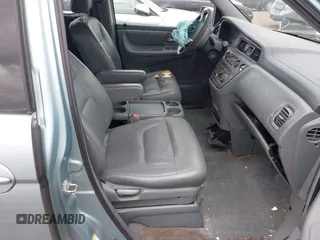 2004 Honda Odyssey EX-L with VIN 5FNRL18064B060817, listed as a IAAI auction lot 42032796 with 200,999 mi miles and . Bid and sale history available at DreamBid. Image 5.