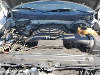 2012 Ford F-150 XL z VIN 1FTFW1CT1CKD56728, wystawiony jako Copart lot #56983605 z przebiegiem 166 563 mil mil oraz Szkoda całkowita • Salvage title. Historia ofert i sprzedaży dostępna na DreamBid. Obrazek 11.