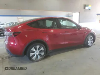 2024 Tesla Model Y Long Range with VIN 7SAYGDEE6RF995069, listed as a Copart auction lot 57085405 with 22,302 mi miles and Salvage title. Bid and sale history available at DreamBid. Image 3.