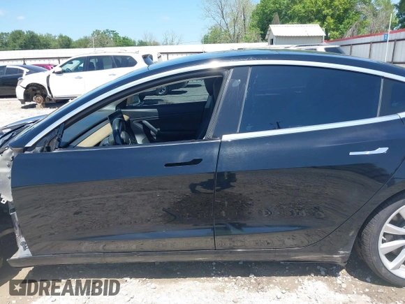 2018 Tesla Model 3 Long Range Battery with VIN 5YJ3E1EAXJF019907, listed as a IAAI auction lot 41995969 with Not Provided miles and . Bid and sale history available at DreamBid. Image 15.