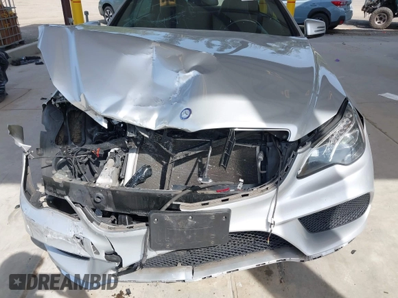 2016 Mercedes-Benz E 400 with VIN WDDKJ6HB6GF328700, listed as a IAAI auction lot 42157340 with 125,183 mi miles and . Bid and sale history available at DreamBid. Image 12.