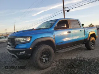 2021 Ram 1500 TRX with VIN 1C6SRFU98MN757772, listed as a Copart auction lot 49923465 with 27,250 mi miles and Salvage Title. Bid and sale history available at carsss.com. Image 1.