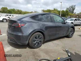 2025 Tesla Model Y Long Range with VIN 7SAYGDED6SF228626, listed as a Copart auction lot 47654525 with 2,087 mi miles and Salvage Title. Bid and sale history available at DreamBid. Image 3.